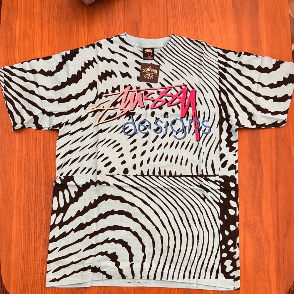 Stüssy Designs Graphic Tee - Light Blue, Black, Pink